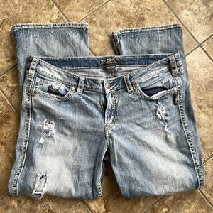 Women’s Silver Twisted jeans. Size 20 with 31 inch inseam.